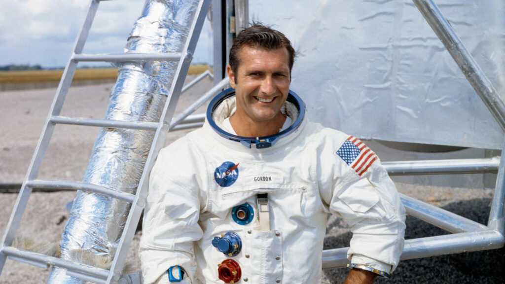 Astronaut Gordon in front of space equipment