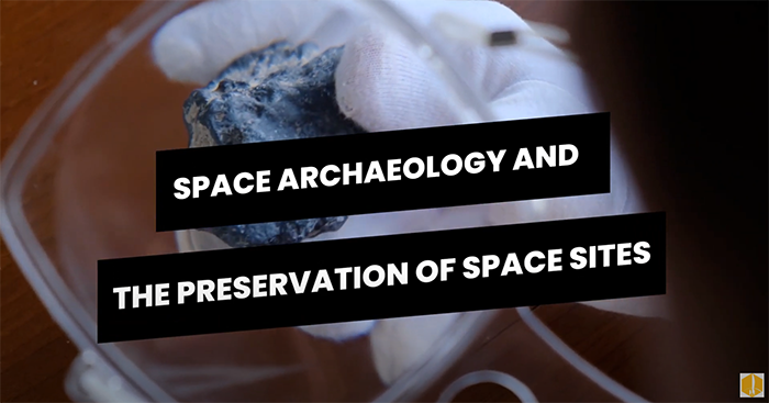 Space archaeology and the Preservation of Space sites with the image of a person holding a rock with gloves in the background