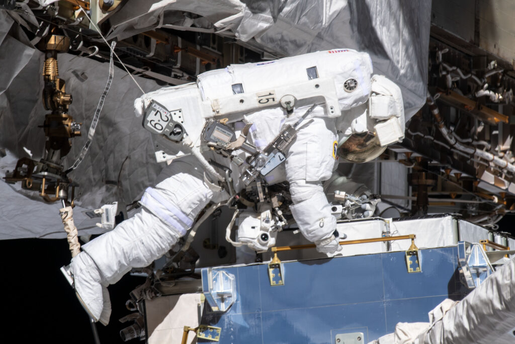ISS Spacewalk — Credit: NASA Astronauts sometimes work outside the space station. Working outside is called a spacewalk.